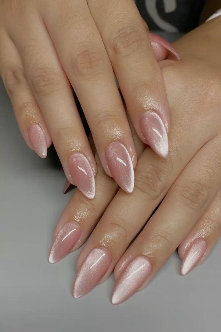 Long almond extensions in a soft pink chrome finish